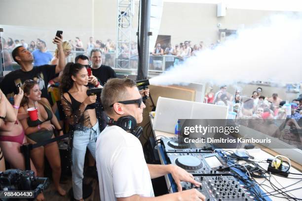 Model Shanina Shaik enjoys DJ Kaskade performance during HQ2 Beachclub Opening at Ocean Resort Casino on June 30, 2018 in Atlantic City, New Jersey.