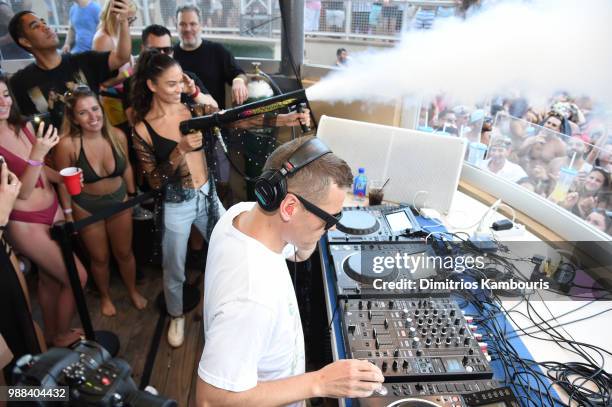 Model Shanina Shaik enjoys DJ Kaskade performance during HQ2 Beachclub Opening at Ocean Resort Casino on June 30, 2018 in Atlantic City, New Jersey.