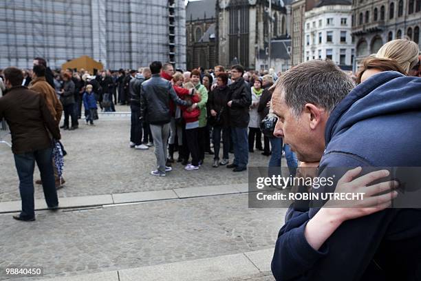 Person attending the Remembrance Day reacts on the Dam in Amsterdam, on May 4, 2010 following a mass panick amid a rumour. Several man, also...