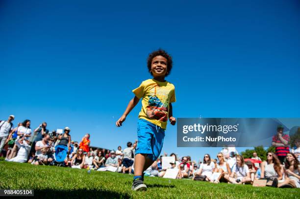 Hundreds of people were gathering on 30 June 2018 at the Museumplein in the center of Amsterdam during a demonstration against Trump administration....