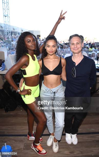 Models Leomie Anderson and Shanina Shaik and Niche Media and DuJour Media Jason Binn attend HQ2 Beachclub Opening at Ocean Resort Casino on June 30,...