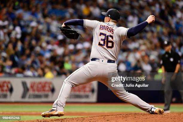 Will Harris of the Houston Astros throws a pitch in the sixth inning against the Tampa Bay Rays on June 30, 2018 at Tropicana Field in St Petersburg,...
