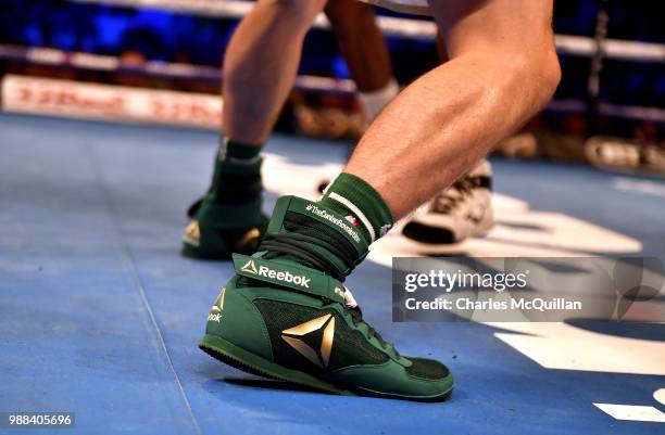 Michael Conlan's boots with the legend 'The Conlan Revolution' stitched into it's ankle section during his bout with Adeilson Dos Santos as part of...