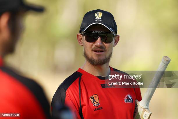 Cameron Bancroft of the Desert Blaze speaks to his team mate as he prepares for the Strike League match between the Desert Blaze and the Southern...