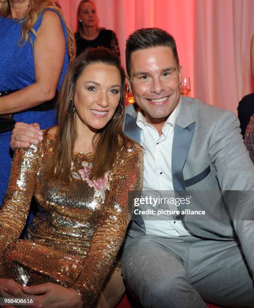 Entrepreneur Simone Ballack and Dutch pop singer Eloy de Jongs pose at the gala of the mon Cheri Barbara DAy at the Postpalast in Munich, Germany, 30...