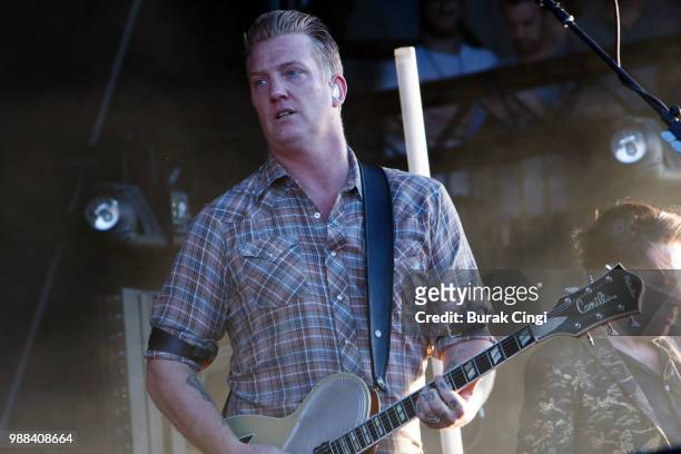 Josh Homme of Queens of the Stone Age performs at the Queens of the Stone Age and Friends show at Finsbury Park on June 30, 2018 in London, England.