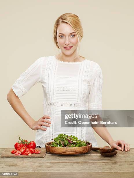 female with ingredients for a fresh salad - salad bowl stock pictures, royalty-free photos & images