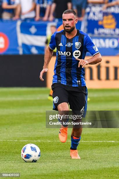 Montreal Impact defender Rudy Camacho runs in control of the ball during the Sporting Kansas City versus the Montreal Impact game on June 30 at Stade...