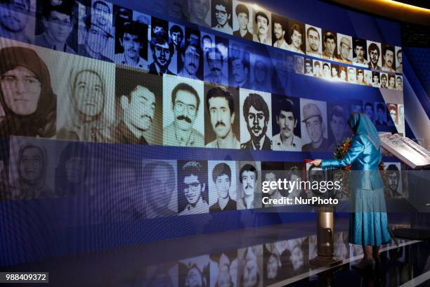 Iran's opposition leader Maryam Rajavi pays tribute of victims killed by the regime in Iran . Annual gathering of Free Iran-Alternative 100 ASHRAF at...