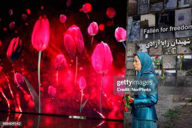 Iran's opposition leader Maryam Rajavi pays tribute of victims killed by the regime in Iran . Annual gathering of Free Iran-Alternative 100 ASHRAF at...