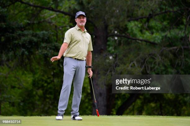 Jerry Kelly reacts to a putt on the 17th hole during round three of the U.S. Senior Open Championship at The Broadmoor Golf Club on June 30, 2018 in...