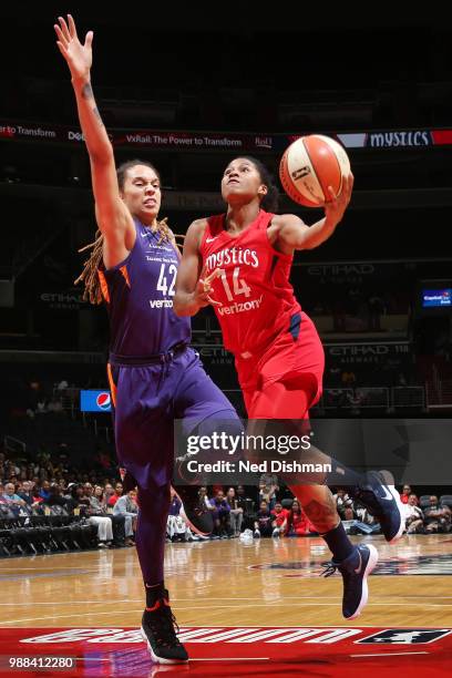 Tierra Ruffin-Pratt of the Washington Mystics goes to the basket against the Phoenix Mercury on June 30, 2018 at the Verizon Center in Washington,...