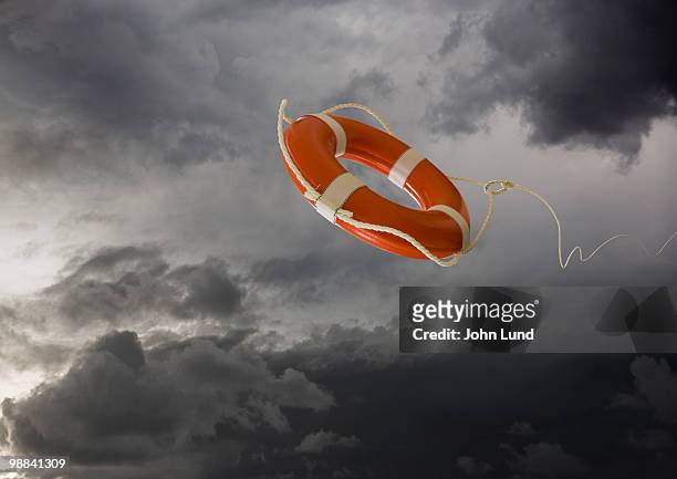 life rings symbolize help is on the way and rescue - sausalito stockfoto's en -beelden