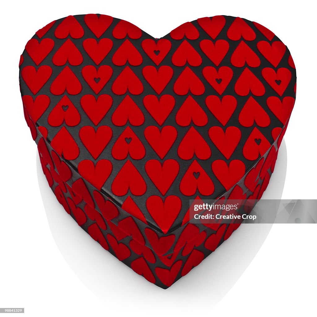 Heart shaped box with red heart decoration