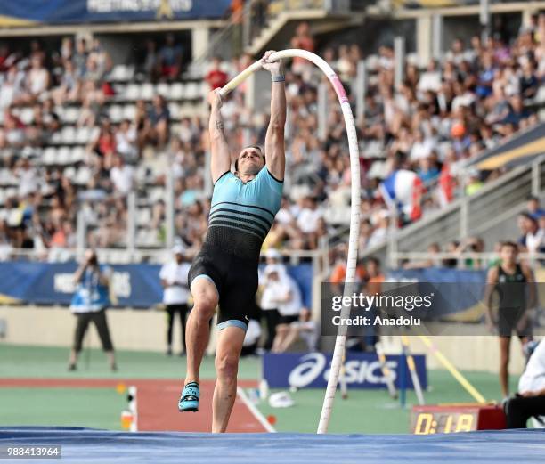 Renaud Lavillenie of France competes in the Men's pole vault competition at the IAAF Diamond League meeting at the Stade Charlety in Paris, France on...