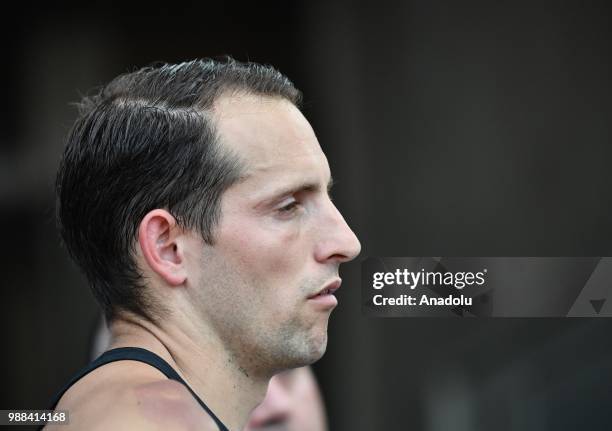 Renaud Lavillenie of France gestures before the Men's pole vault competition at the IAAF Diamond League meeting at the Stade Charlety in Paris,...