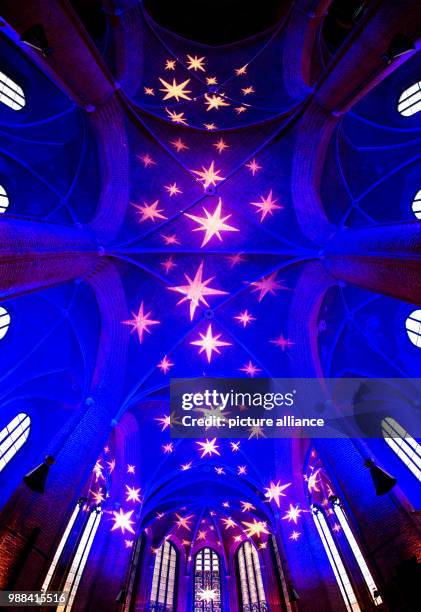 Picture of the festively illuminated Marktkirche in Hanover, Germany, 01 December 2017. The parish is holding a festive "Advent Calendar", whereby...