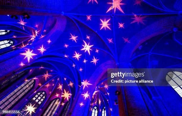 Picture of the festively illuminated Marktkirche in Hanover, Germany, 01 December 2017. The parish is holding a festive "Advent Calendar", whereby...