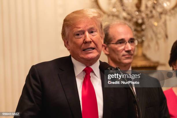 President Donald Trump holds an event celebrating the Republican tax cut plan in the East Room of the White House in Washington, D.C., on Friday,...