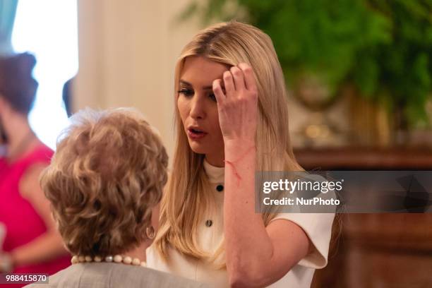 Ivanka Trump, daughter and assistant to U.S. President Donald Trump, attends his event celebrating the Republican tax cut plan in the East Room of...