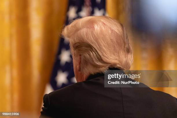 President Donald Trump holds an event celebrating the Republican tax cut plan in the East Room of the White House in Washington, D.C., on Friday,...