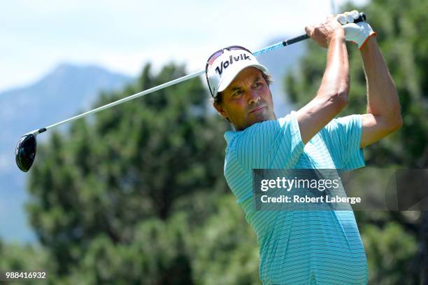 Stephen Ames of Canada makes a tee shot on the third hole during round three of the U.S. Senior Open Championship at The Broadmoor Golf Club on June...