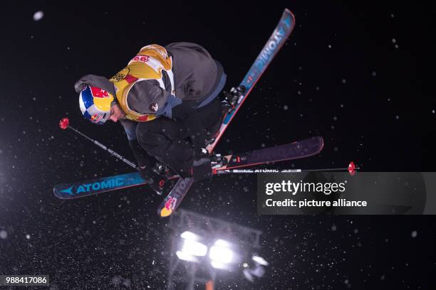 Jonas Hunziker of Switzerland in action in the men's finals of the Big Air Freestyle Skiing World Cup at the SparkassenPark venue in...