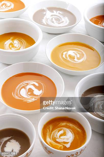 soups with creme fraiche swirls - shana novak stockfoto's en -beelden