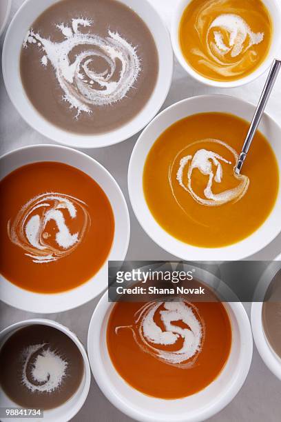 soups from above with creme fraiche - shana novak stock pictures, royalty-free photos & images