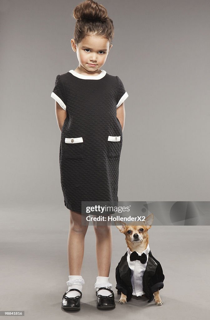 Girl with dog - dressed alike