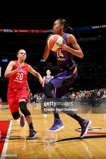 DeWanna Bonner of the Phoenix Mercury handles the ball against the Washington Mystics on June 30, 2018 at the Verizon Center in Washington, DC. NOTE...