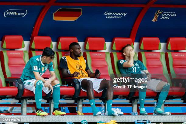 Mesut Oezil of Germany, Antonio Ruediger of Germany and Marco Reus of Germany look dejected after the 2018 FIFA World Cup Russia group F match...