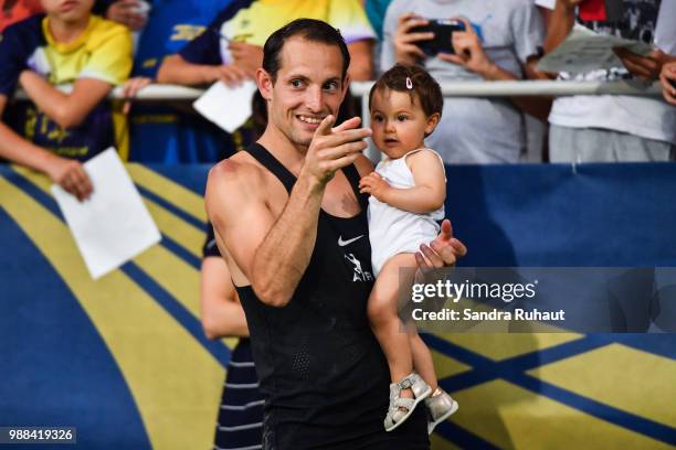 Renaud Lavillenie of France with his daughter during the Pole Vault men of the Meeting of Paris on June 30, 2018 in Paris, France.