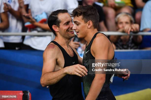 Renaud Lavillenie of France and Armand Duplantis of Sweden during the Pole Vault of the Meeting of Paris on June 30, 2018 in Paris, France.