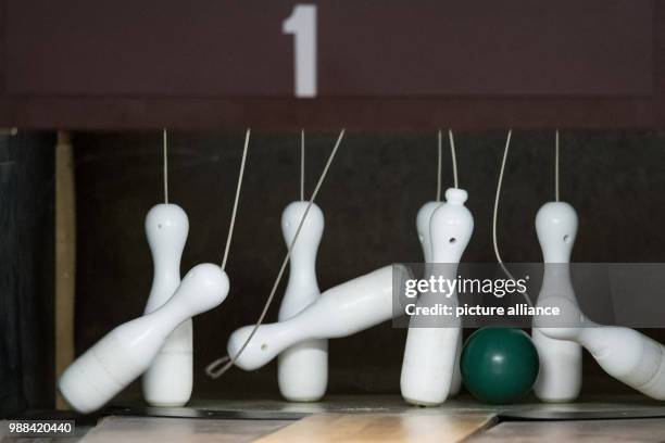 Bowling ball hits the pins of a fully automated bowling alley at the bowling centre in Bovenden, Germany, 1 December 2017. Bowling used to be popular...