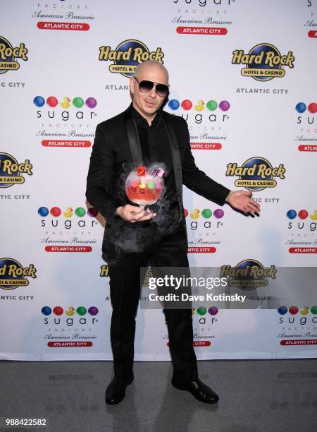 Pitbull attend the preview of the Sugar Factory at Hard Rock Hotel & Casino Atlantic City on June 30, 2018 in Atlantic City, New Jersey.
