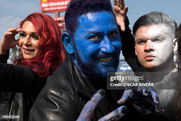 Members of the Gay, Bisexual and Transgender and Intersex community take part in the annual Gay Pride Parade in June 30, 2018 in San Salvador.