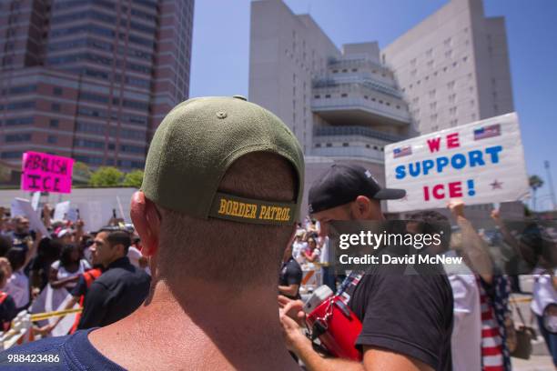 Pro-Trump counter demonstrators face protesters decrying Trump administration immigration and refugee policies on June 30, 2018 in Los Angeles,...