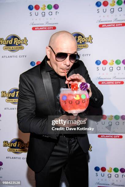 Pitbull attend the preview of the Sugar Factory at Hard Rock Hotel & Casino Atlantic City on June 30, 2018 in Atlantic City, New Jersey.