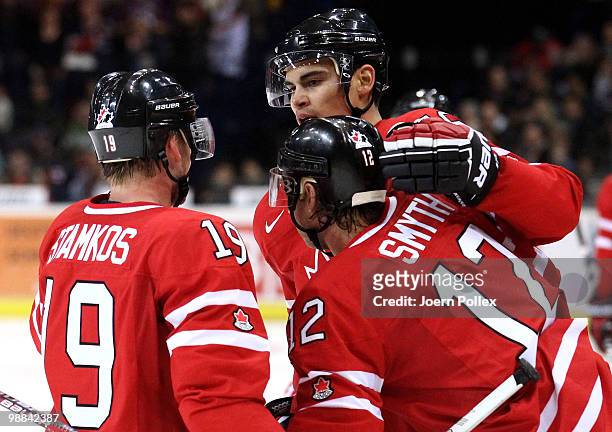 Rene Bourque of Canada celebrates with his team mates after scoring his team's second goal during the pre IIHF World Championship match between...