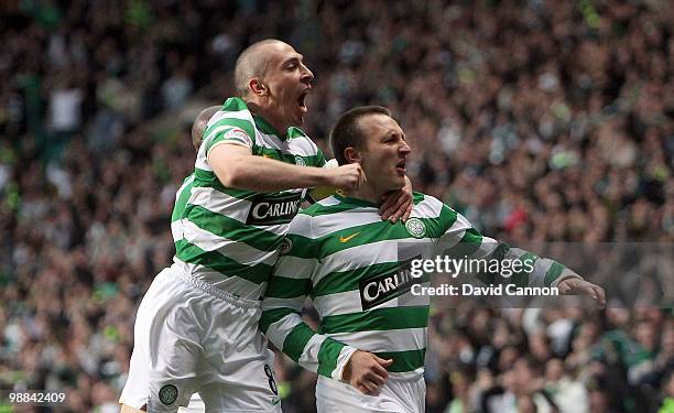Lee Naylor and Scott Brown of Celtic celebrate Naylor scoring Celtic's first goal during the Clydesdale Bank Scottish Premier League match between...