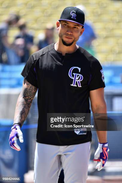 Colorado Rockies right fielder Carlos Gonzalez looks on during batting practice before a MLB game between the Colorado Rockies and the Los Angeles...