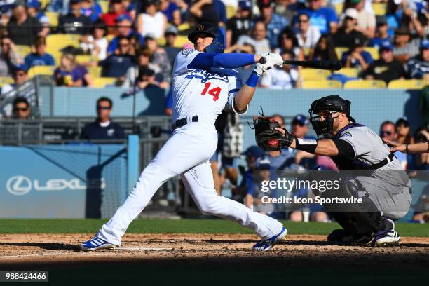 Los Angeles Dodgers outfielder Enrique Hernandez hits a solo home run during a MLB game between the Colorado Rockies and the Los Angeles Dodgers on...