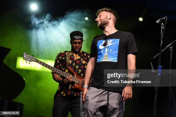 Koleoso and Dylan Jones of Ezra Collective perform on the Arena stage on Day 2 of Love Supreme Festival on June 30, 2018 in Brighton, England.