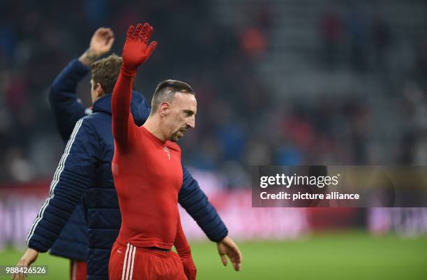 Franck Ribery of Munich waves to fans after the German Bundesliga football match between Bayern Munich and Hanover 96 at the Allianz Arena in Munich,...