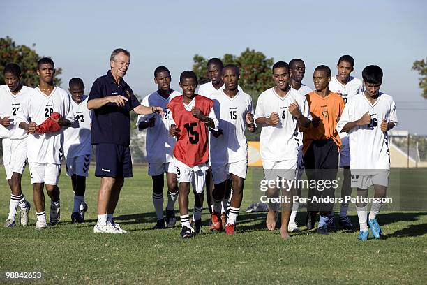 Roald Poulsen, a Danish soccer coach, instructs young and talented soccer players on a field on April 8 in Cape Town, South Africa. Mr. Poulsen is...