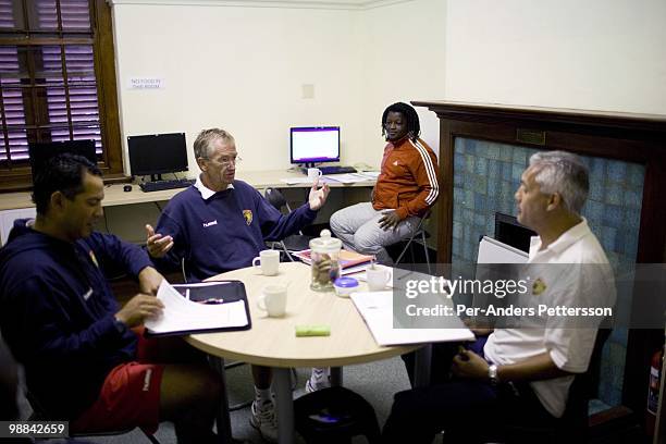 Roald Poulsen, a Danish soccer coach, holds an internal meeting after a training session on April 9 in Cape Town, South Africa. Cape United is a...