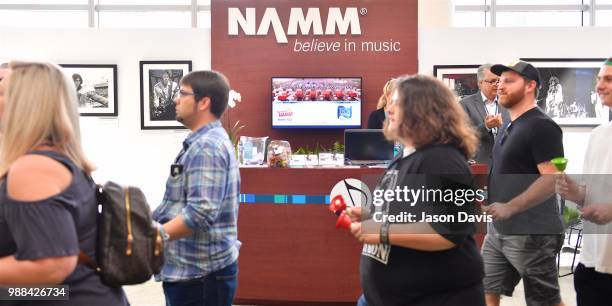 The Make Music Day Parade of Bell Ringers perform walking through the crowd of attendees during The Make Music Experience at Summer NAMM on June 30,...