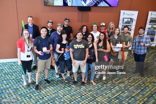 The Make Music Day Parade of Bell Ringers perform walking through the crowd of attendees during The Make Music Experience at Summer NAMM on June 30,...