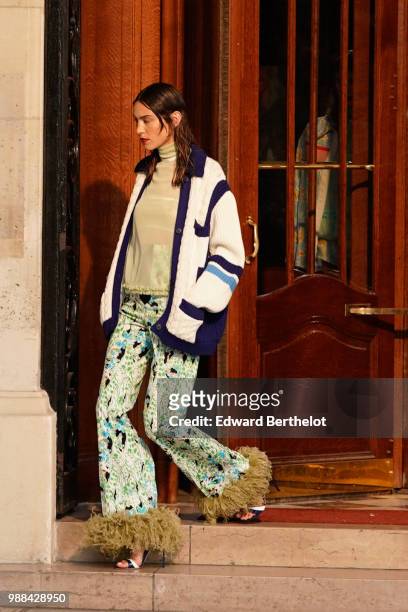 Alexa Chung, outside the Miu Miu Cruise Collection show, outside the Hotel Regina, in Paris, on June 30, 2018 in Paris, France.